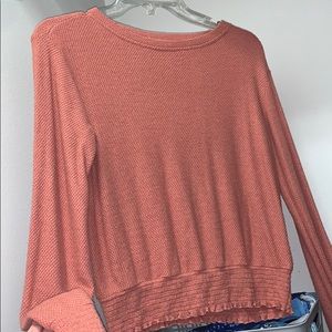 really cute cropped top with ruffle sleeve.